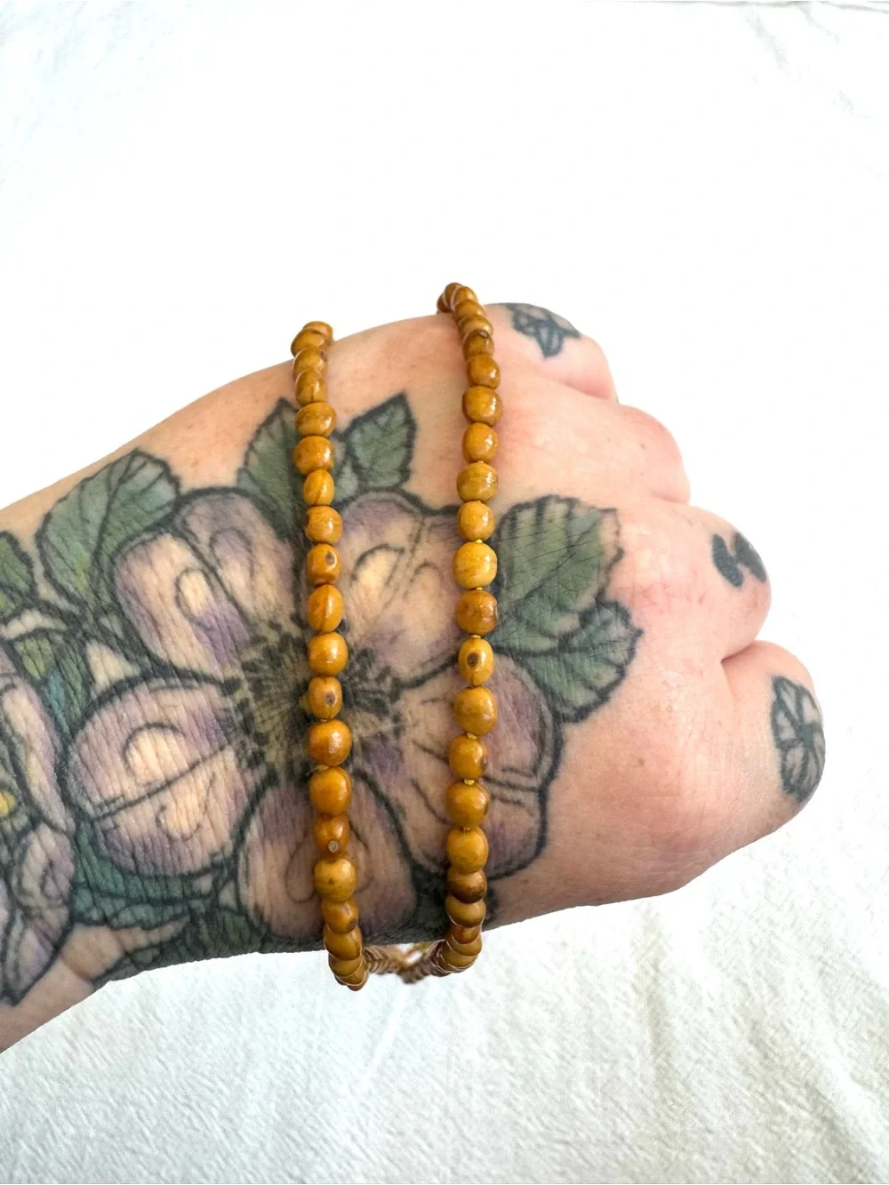 Meditation Beads: Knotted Chord with Small Beaded Sections and Tassels.